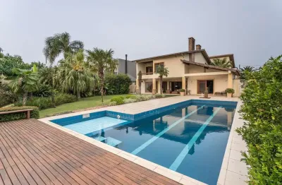 Casa em condomínio fechado com 5 quartos à venda na avenida juca batista, 8000, belém novo, porto alegre por r$ 3.500.000