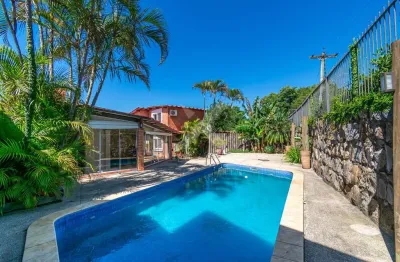 Casa com 3 quartos à venda na rua abdo jorge curi, 101, rubem berta, porto alegre por r$ 1.050.000