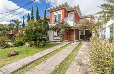 Casa em condomínio fechado com 3 quartos à venda na avenida juca batista, 8000, belém novo, porto alegre por r$ 1.750.000