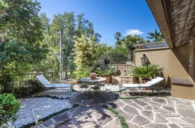 Casa em condomínio fechado com 3 quartos à venda na rua osório tuyuty de oliveira freitas, 120, três figueiras, porto alegre por r$ 3.200.000