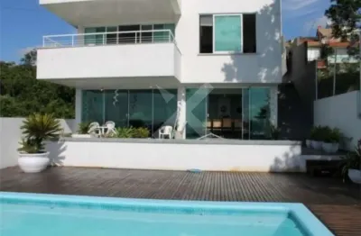 Casa com 3 quartos à venda na alcebides antonio dos santos, 355, nonoai, porto alegre por r$ 1.750.000