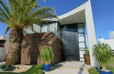 Casa em condomínio fechado com 6 quartos à venda na estrada do mar, 1000, zona nova, capão da canoa por r$ 8.000.000