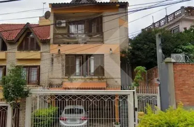 Casa com 3 quartos à venda na rua comendador creidy, 51, três figueiras, porto alegre por r$ 1.600.000