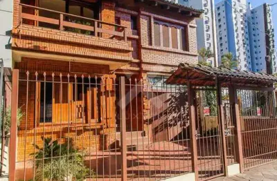 Casa em condomínio fechado com 3 quartos à venda na Rua General Caldwell, 857, Menino Deus, Porto Alegre por R$ 1.077.000