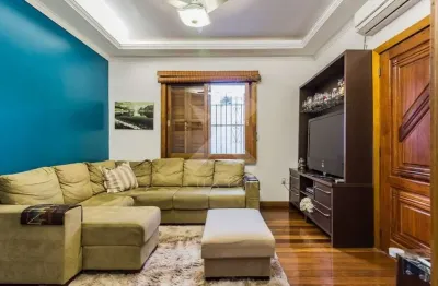 Casa com 5 quartos à venda na rua guilherme schell, 161, santo antônio, porto alegre por r$ 950.000