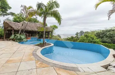 Casa com 5 quartos à venda na rua bororó, 301, vila assunção, porto alegre por r$ 4.800.000