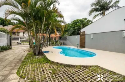 Casa com 4 quartos à venda na avenida josé gertum, 369, chácara das pedras, porto alegre por r$ 2.000.000