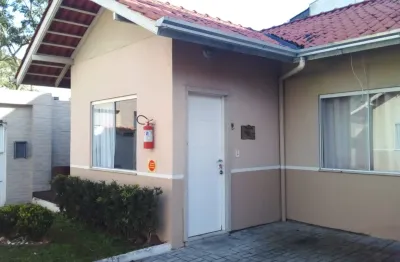 CASA MOBILIADA dentro de um CONDOMÍNIO, inclusive com Máquina de Lavar Roupas e Ar Condicionado