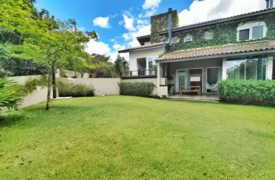 Casa em condomínio fechado com 4 quartos à venda na rodovia haroldo soares glavan, 2064, cacupé, florianópolis por r$ 3.880.000