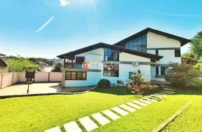 Casa em condomínio fechado com 4 quartos à venda na rodovia haroldo soares glavan, 1900, cacupé, florianópolis por r$ 2.900.000