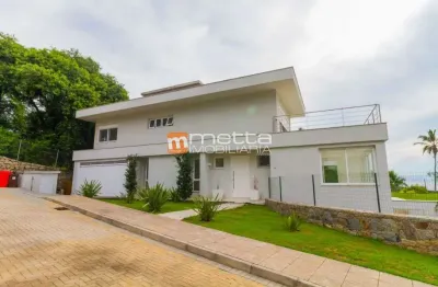 Casa em condomínio fechado com 4 quartos à venda na rodovia haroldo soares glavan, 3321, cacupé, florianópolis por r$ 18.900.000