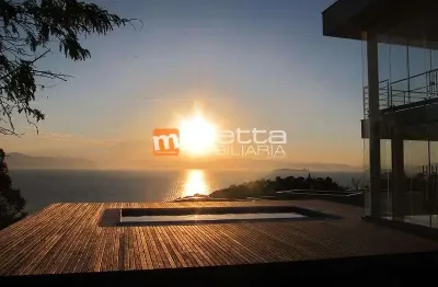 Casa em condomínio fechado com 3 quartos à venda na rodovia haroldo soares glavan, 4430, cacupé, florianópolis por r$ 6.000.000