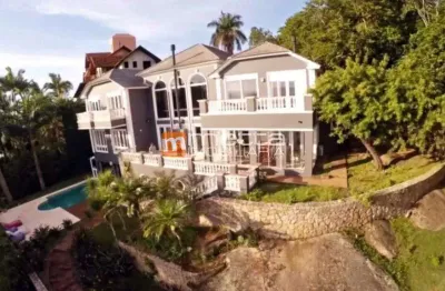 Casa em condomínio fechado com 5 quartos à venda na rua bico de lacre, 203, cacupé, florianópolis por r$ 12.000.000