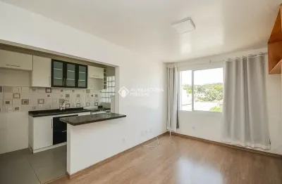 Apartamento semimobiliado de 2 quartos com 1 vaga de garagem no Menino Deus!