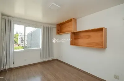 Apartamento semimobiliado de 2 quartos com 1 vaga de garagem no menino deus!