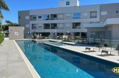 Apartamento semimobiliado com 02 dormitórios em condomínio perto da praia dos ingleses