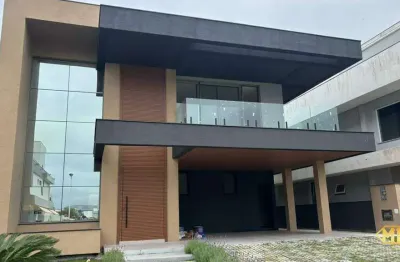 Casa de alto padrão em condomínio na praia dos ingleses, disponível para locação anual