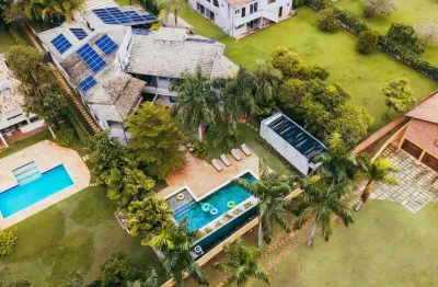 Casa luxuosa em condomínio colina das estrelas com 5 suítes à venda por r$ 7.000.000,00.