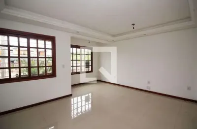 Casa com 3 quartos à venda na Rua Itacyr Rossi, Guarujá, Porto Alegre