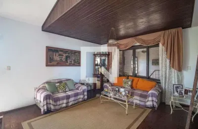 Casa com 4 quartos à venda na Rua Maurílio Ferreira, Campo Novo, Porto Alegre