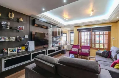 Casa com 3 quartos à venda na Rua Lloyd de Andrade Polidoro, Campo Novo, Porto Alegre