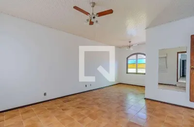 Casa com 4 quartos à venda na Avenida Guarujá, Guarujá, Porto Alegre