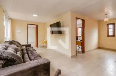 Casa com 4 quartos à venda na Rua Carijó, Vila Nova, Porto Alegre