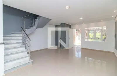 Casa com 3 quartos à venda na Rua Doutor Cláudio Walter Ferreira da Silva, Guarujá, Porto Alegre