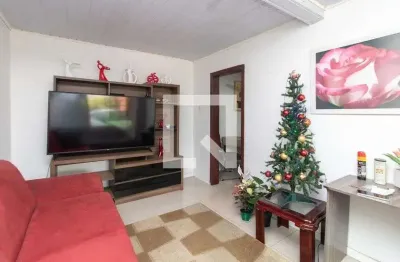 Casa com 4 quartos à venda na Rua Atílio Superti, Vila Nova, Porto Alegre