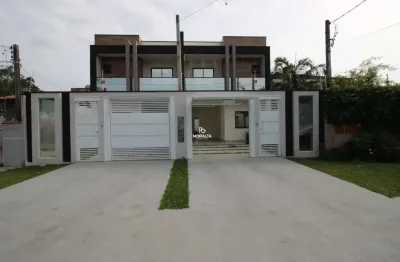 Excelente sobrado com faxada moderna na região central com 03 suítes