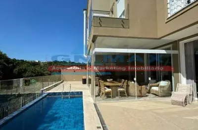 Casa em alphaville 4 suítes | área gourmet com churrasqueira | living com pé direito alto |