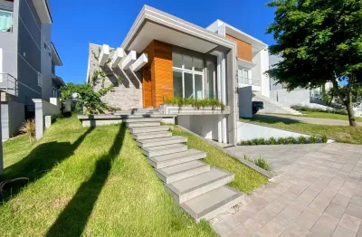 Casa térrea com 3 suítes no alphaville gravataí, 220m², garagem subterrânea