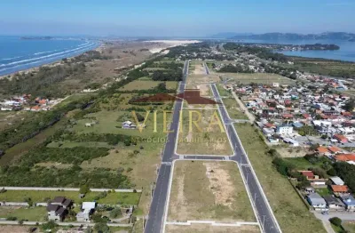 Imbituba internacional - loteamento completo à beira da praia da vila nova, em imbituba/sc