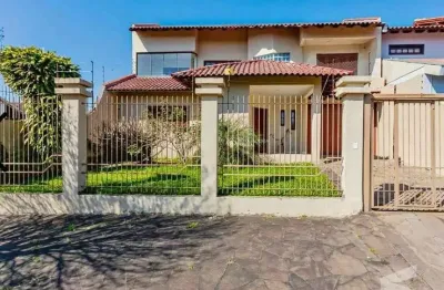 Casa com 4 quartos à venda na avenida doutor severo da silva, 263, loteamento bela vista, canoas por r$ 799.000