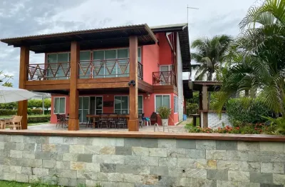 Casa alto padrão à venda em muro alto – 285m² | 4 suítes | piscina | churrasqueira  linda casa com 285m² de área construída, localizada em muro alto, um dos endereços mais valorizados e desejados do l