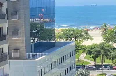Lindo apartamento, 02 dormitórios, sendo 01 suite,  sacada , vista mar , 01 vaga de garagem , prédio com lazer à meia quadra da praia.