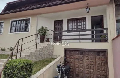 Casa com 3 quartos à venda na rua alexandre dalcuch, 156, bacacheri, curitiba, 230 m2 por r$ 980.000