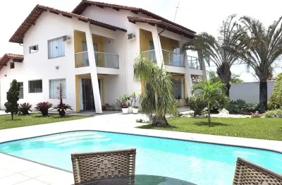 Bela casa com 05 dormitórios e terreno espetacular próximo ao mar em jacaraípe