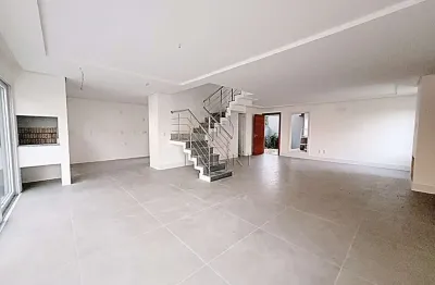 Casa em condomínio fechado com 3 quartos para alugar na avenida coronel marcos, 1239, pedra redonda, porto alegre por r$ 19.000