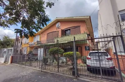 Casa com 8 quartos à venda na rua gomes jardim, 622, santana, porto alegre por r$ 1.800.000