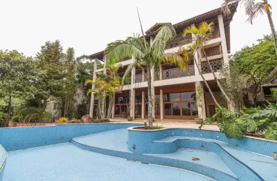 Casa com 4 quartos à venda na rua bororó, 301, vila assunção, porto alegre por r$ 3.699.990