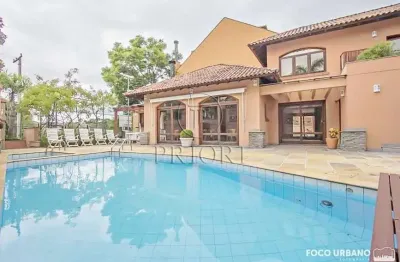 Casa em condomínio fechado com 4 quartos à venda na rua ênio andrade, 320, três figueiras, porto alegre por r$ 7.900.000