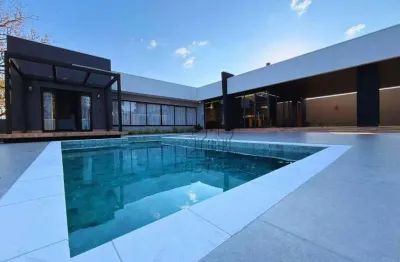 Casa com 3 dormitórios à venda, 200 m² por r$ 2.990.000,00 - jardim itatiaia 1 - londrina/pr