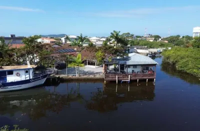 0843 - casa de fundos para o rio perequê, terreno com 739,64m² - centro