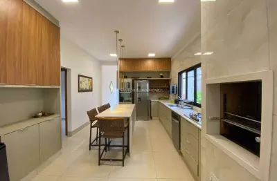 Casa térrea com 4 suítes à venda no condomínio estância dos ipês em uberaba