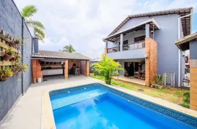 Aproveite o espaço gourmet com a família nesta casa para venda