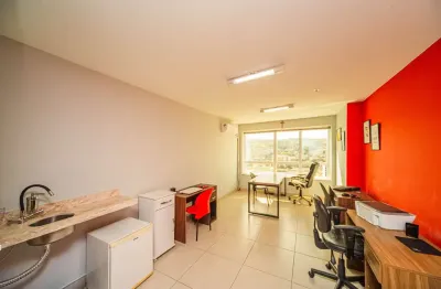 Sala em prédio moderno, com vaga rotativa e no centro para venda ou locação