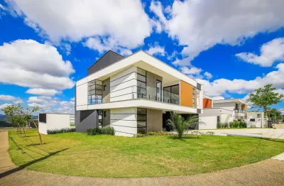 Uma casa projetada para o conforto e momentos em família no alphaville para venda