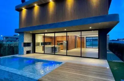 Casa em condomínio 5 dormitórios à venda centro xangri-lá/rs