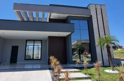 Impecável casa em condomínio! recém construída com alto padrão de acabamento. 3 suítes e living com pé direito alto, churrasqueira e piscina com cascata. uma casa sensacional para você e sua família!